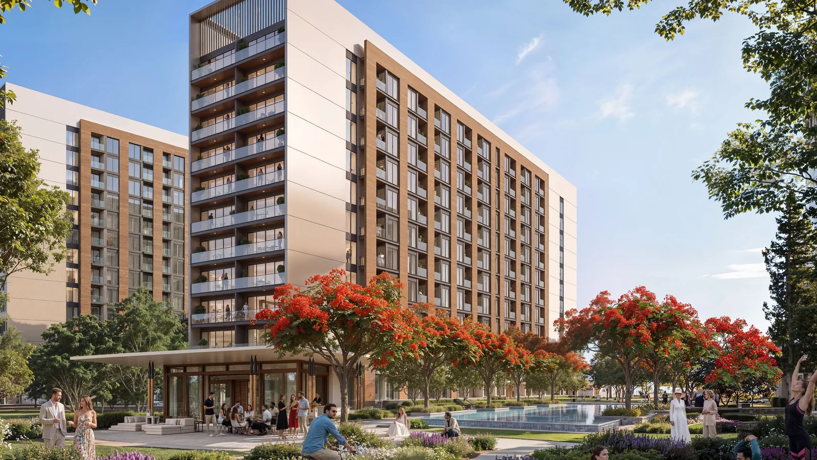 Exterior view of The Woods residential tower at Sobha Sanctuary, with landscaped plaza and flame trees