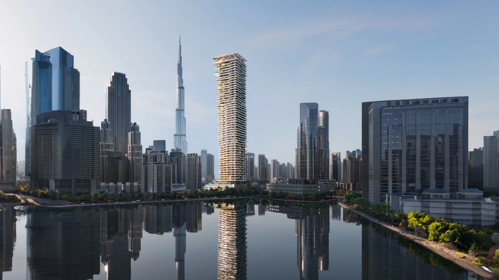 Fairmont Residences Solara Tower rising in the Downtown Dubai skyline beside the Burj Khalifa and Dubai Water Canal