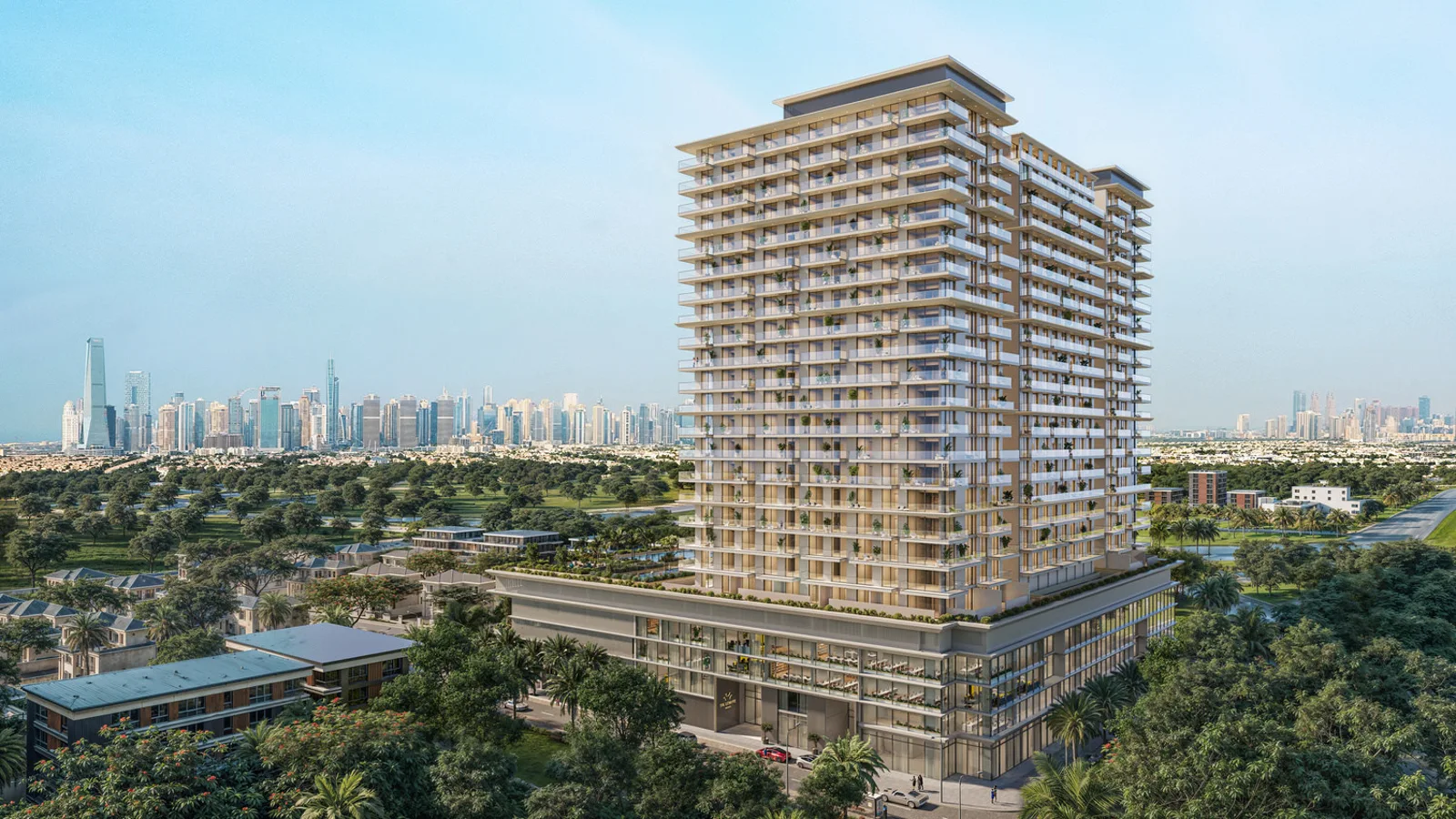 Sol Levante tower rising above Jumeirah Village Triangle with the Dubai skyline in the distance