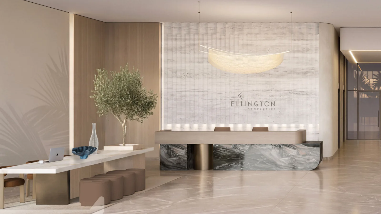 Lobby reception at Everly Place with travertine and marble finishes