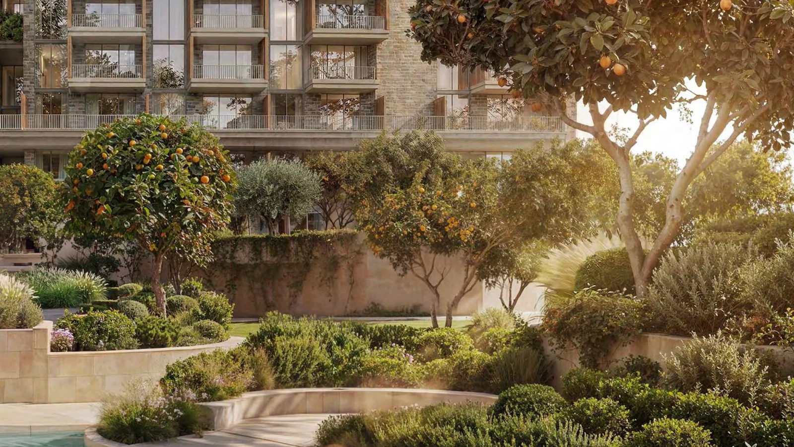Planted offset terraces and orchard landscaping along an Arancia Yards building