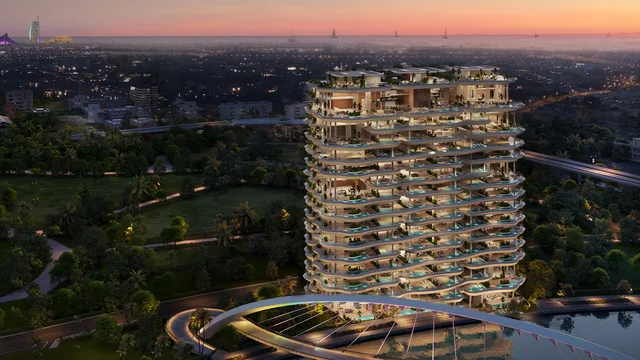 Casa Canal sculptural tower at dusk on the Dubai Water Canal with stacked private-pool balconies, Dubai