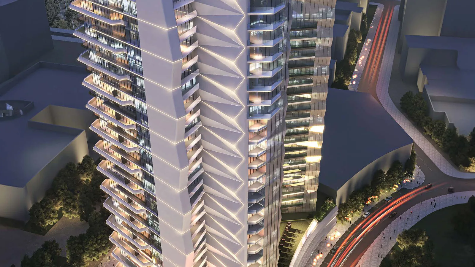 Aerial view of Élevé by Deyaar at dusk, its sculpted tower rising above Downtown Jebel Ali