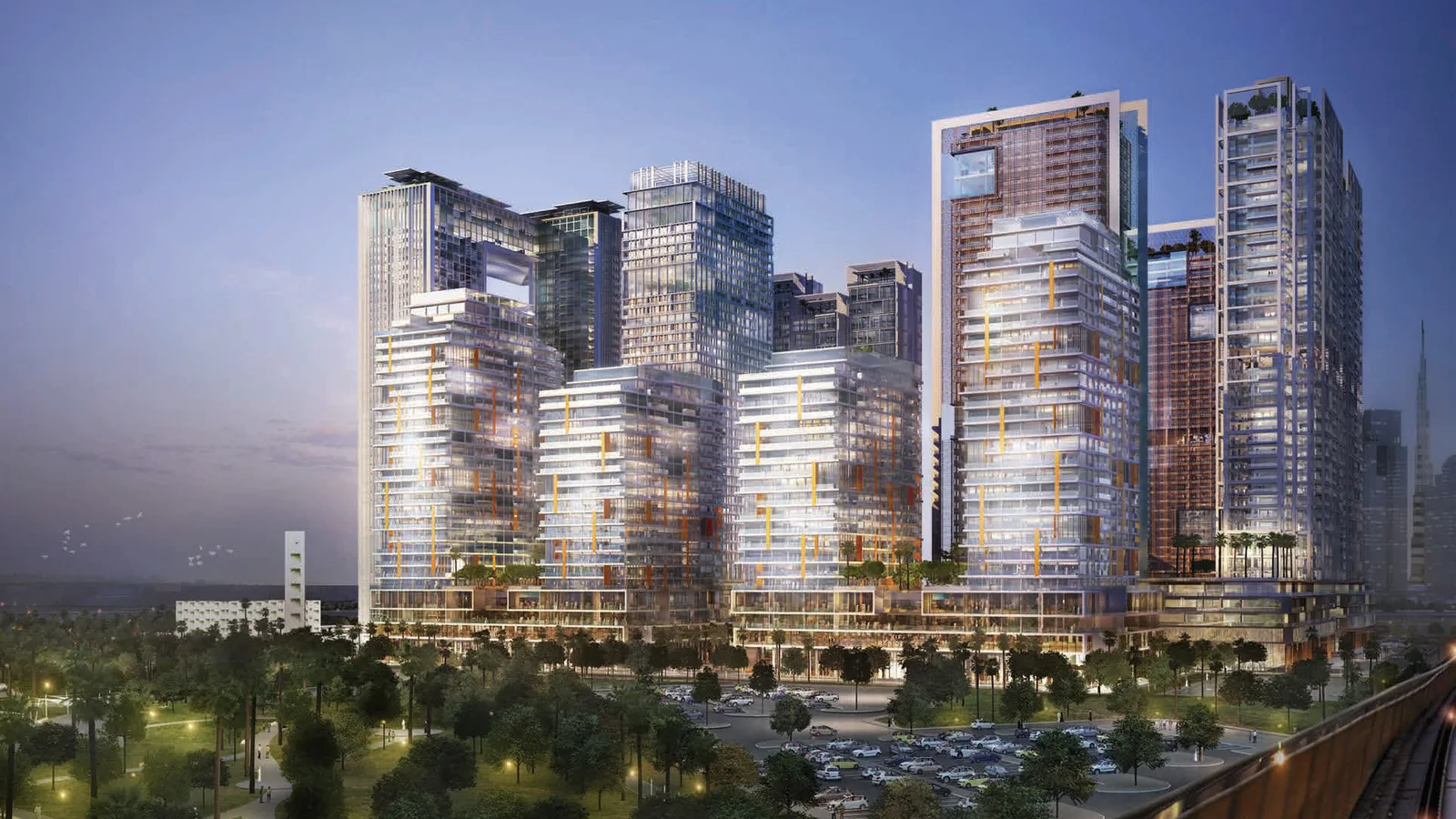 The wasl1 towers of Park Gate Residences by wasl at dusk, overlooking Zabeel Park with the Dubai skyline beyond