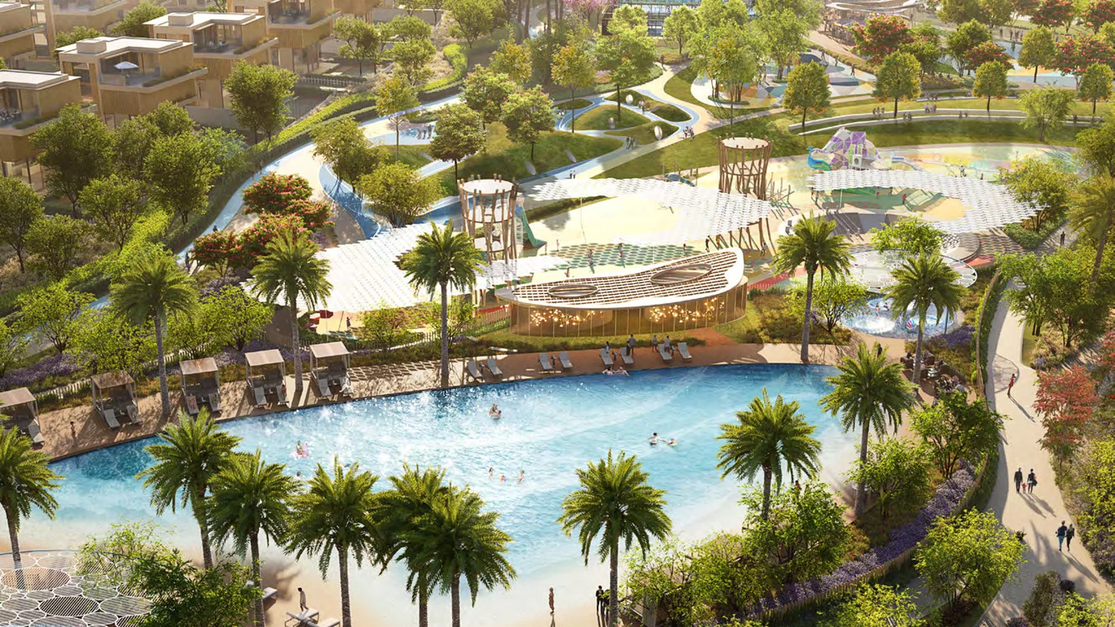 Aerial view of the central park lagoon and landscaped gardens at Nad Al Sheba Gardens, Dubai