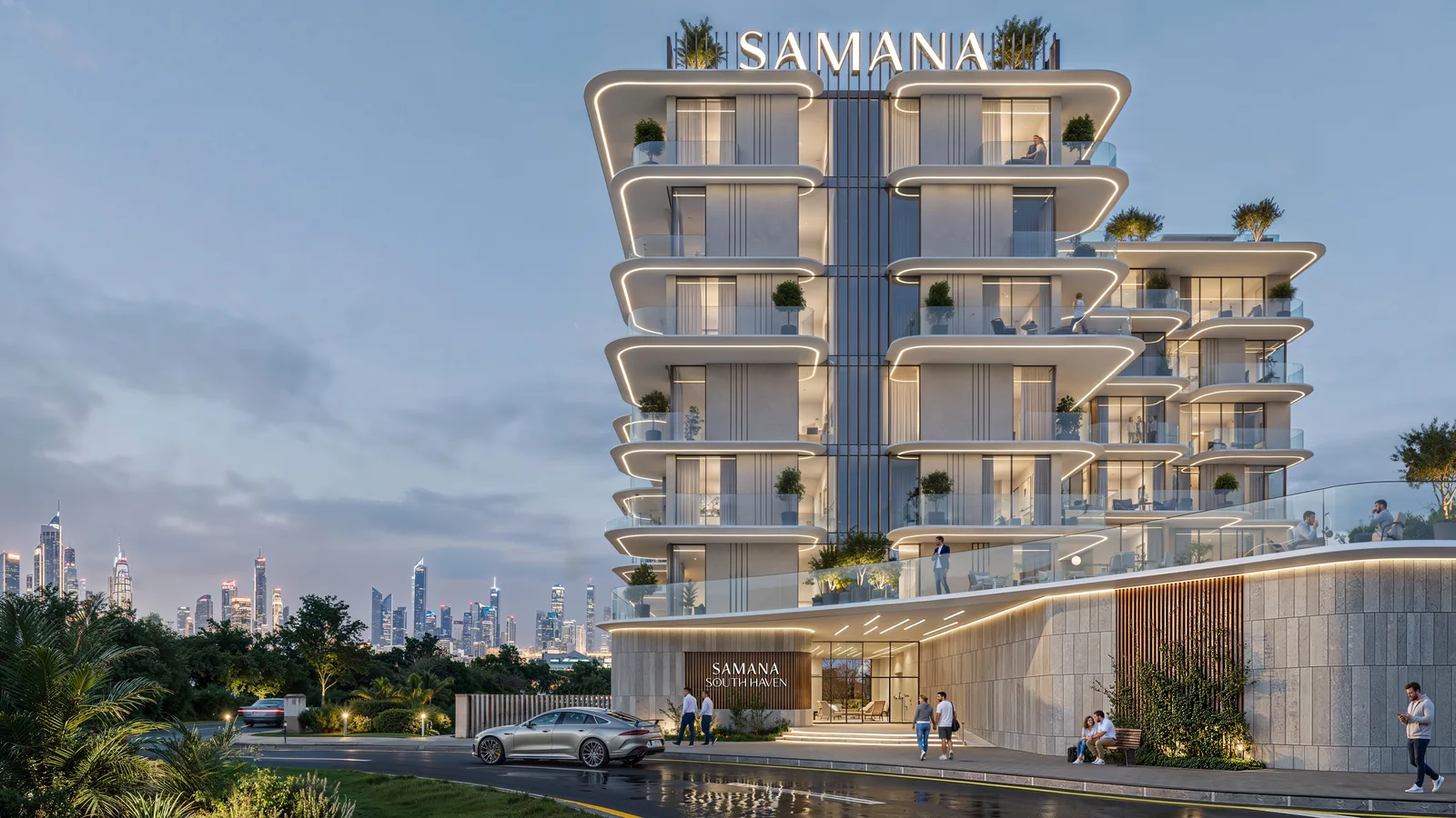 Illuminated entrance and curved facade at SAMANA South Haven