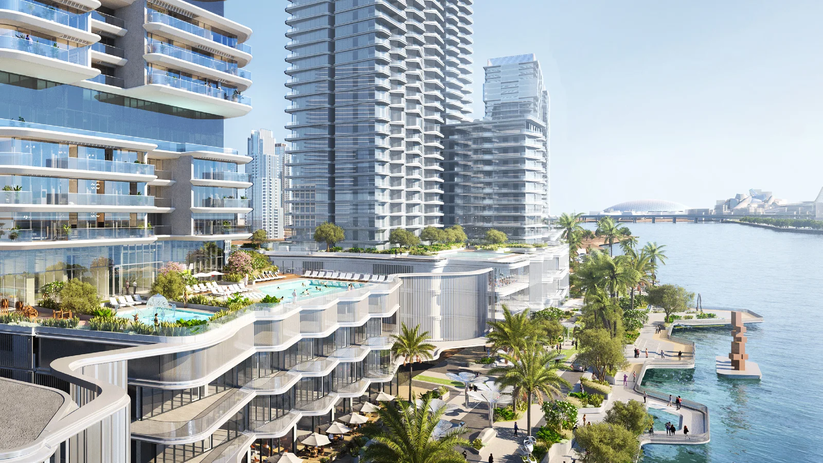 Waterfront podium terraces at The Artery Residences beside Corniche Al Reem