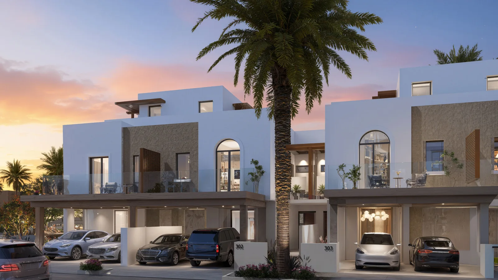 Hayat Phase 6 Residences townhouses with arched windows at sunset