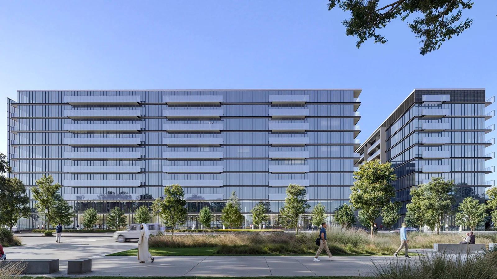 The Gate Phase 5 apartment building overlooking a landscaped plaza in Aljada