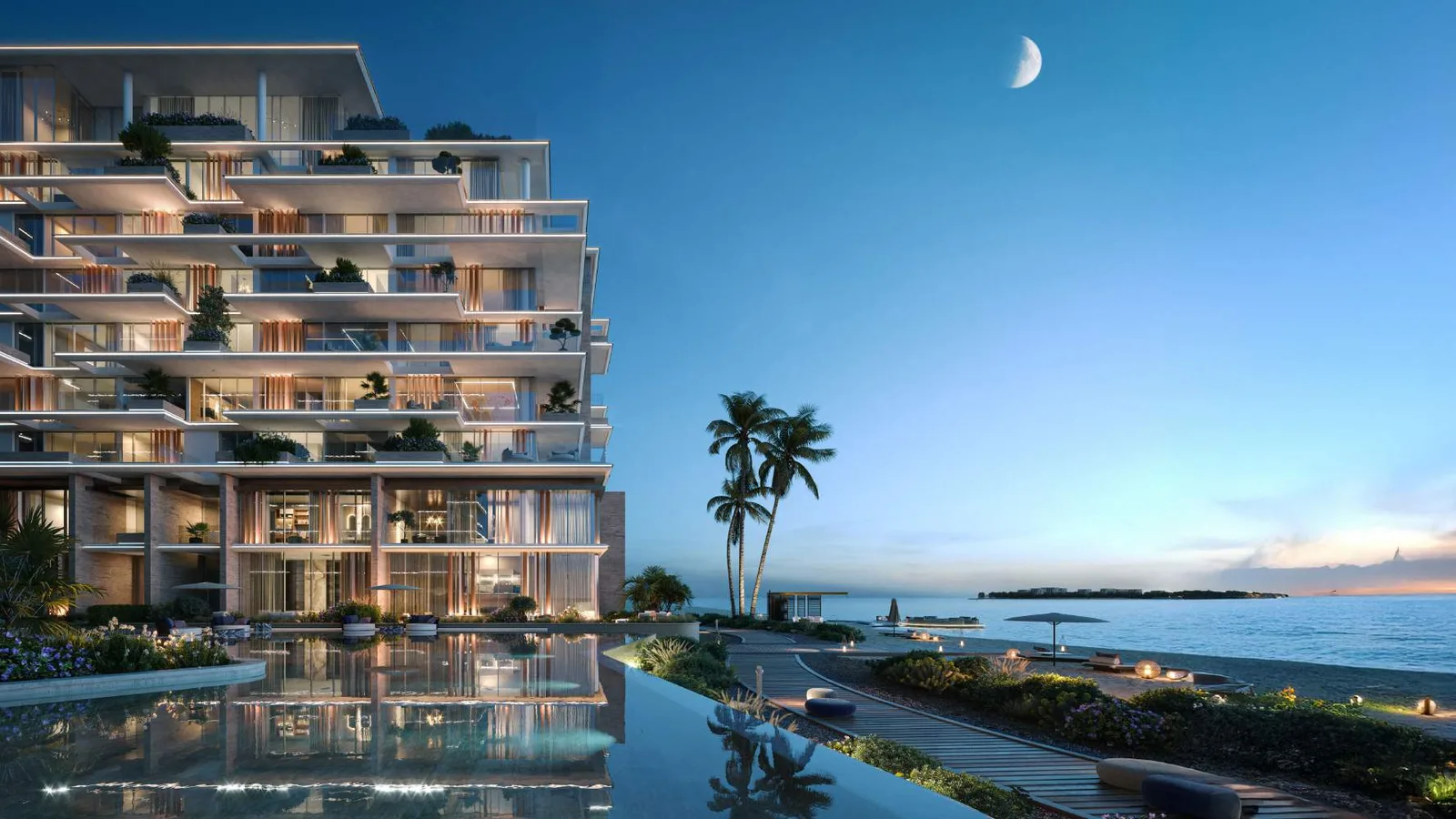 Sea-facing Silena Residences building and pool deck at twilight
