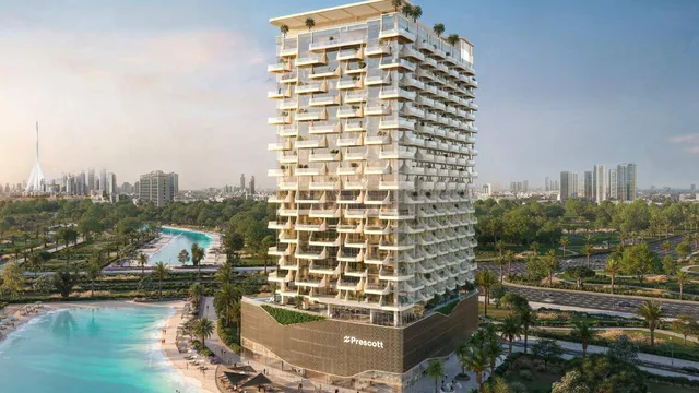 The Caden tower beside the crystal lagoon at Meydan Horizon.