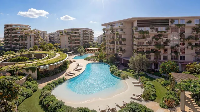 Lagoon pool and landscaped residences at Arancia Yards 2 in City of Arabia