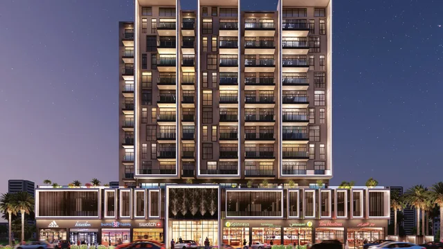 Night exterior view of Tulip Oasis 11 in Majan, Dubai.