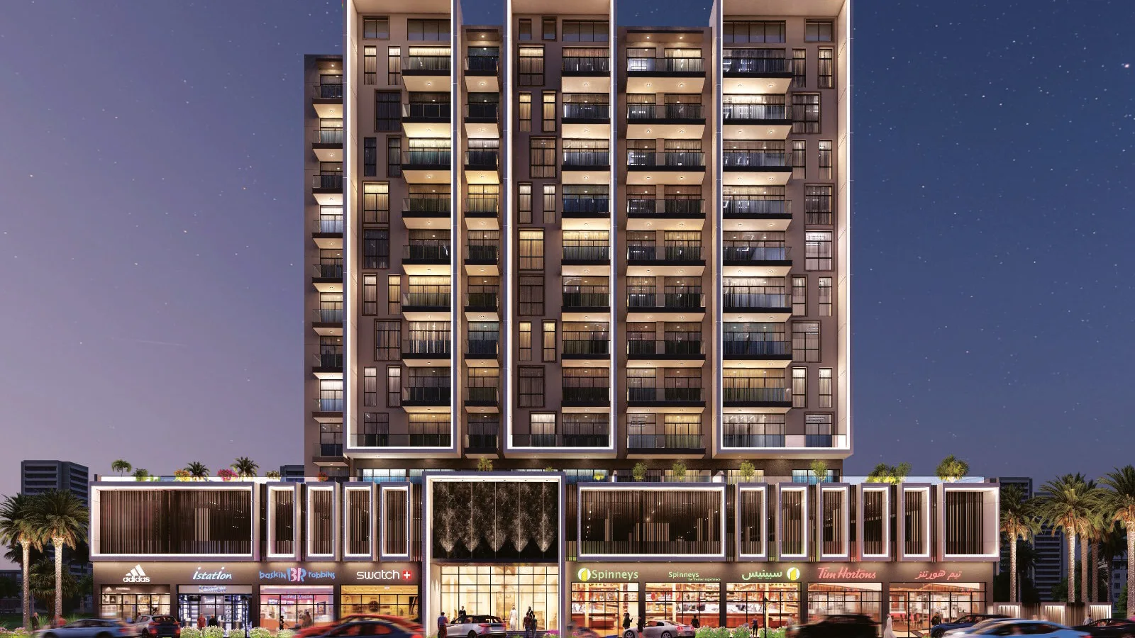 Night exterior view of Tulip Oasis 11 in Majan, Dubai.