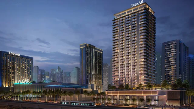 Marina Cove tower exterior beside Dubai Marina Mall at dusk