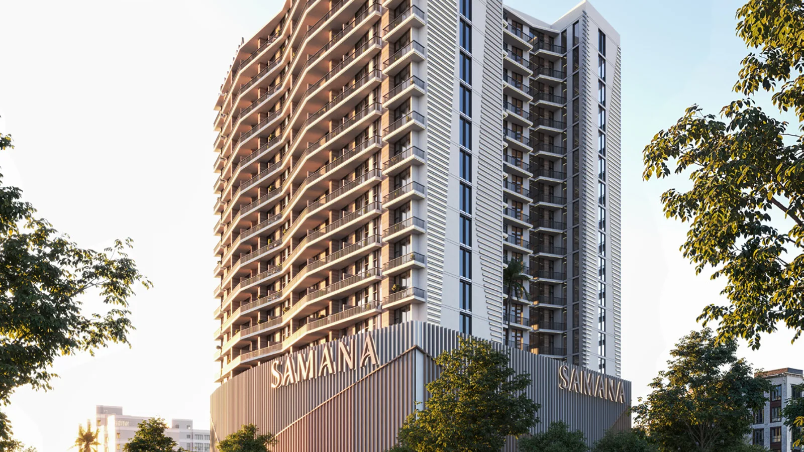 Curved balcony facade and landscaped entrance at Greenfield by Samana