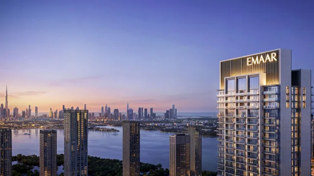 Valia tower at Dubai Creek Harbour with the Dubai skyline at dusk