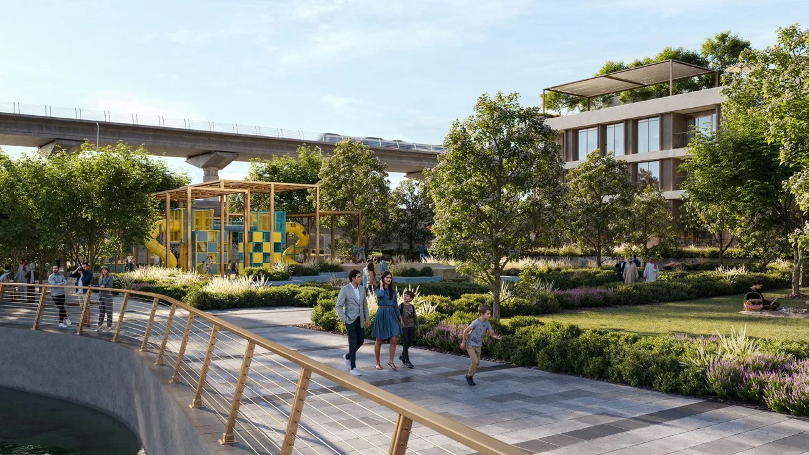 Landscaped waterfront park and play area near Palace Residences Creek Blue.