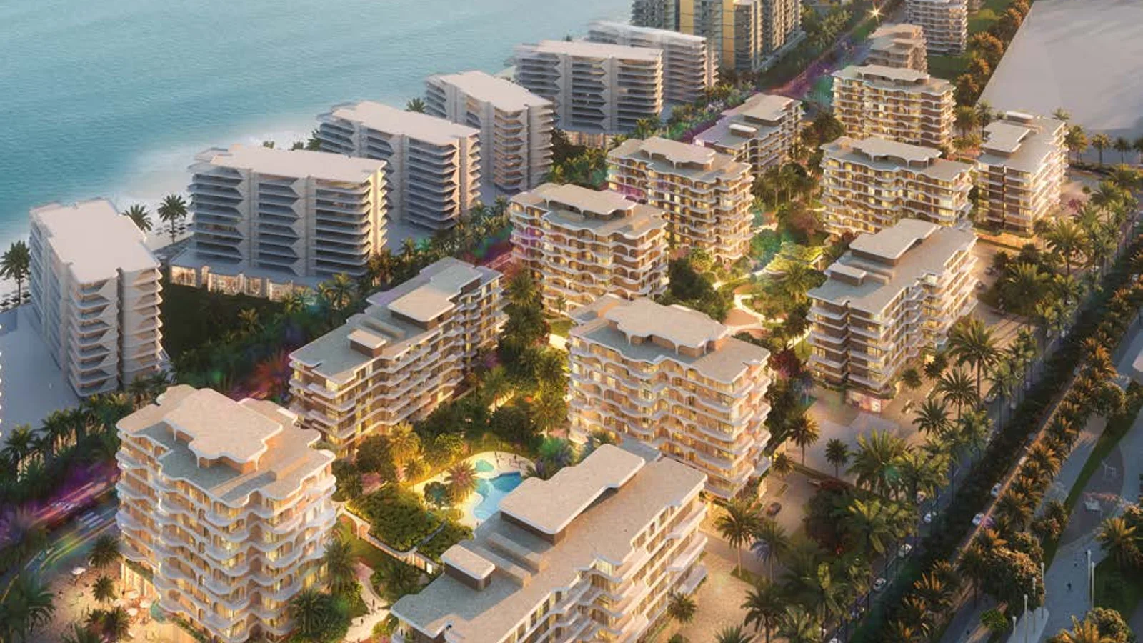 Dusk aerial view of The Beach House Fahid and its waterfront setting.