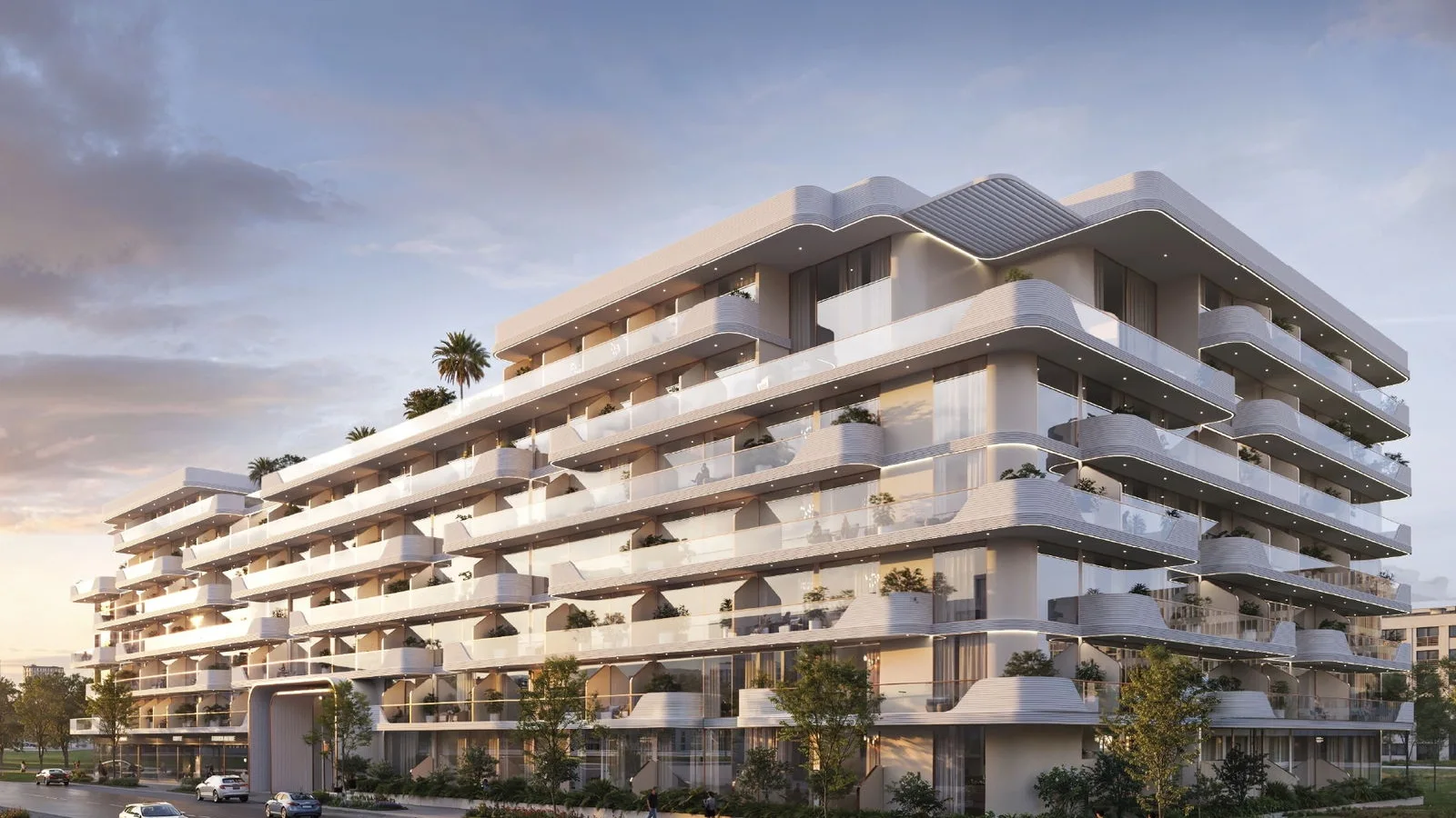 Street-level exterior of Oxford Cove by Iman with curved balconies and landscaped frontage