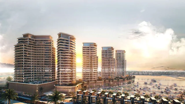 Al Hamra Waterfront's five residential buildings and waterfront townhouses beside the marina