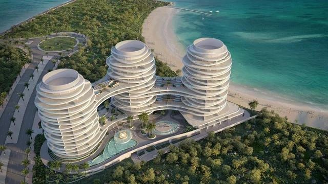 Aerial beachfront view of the three connected towers at La Mer by Elie Saab.
