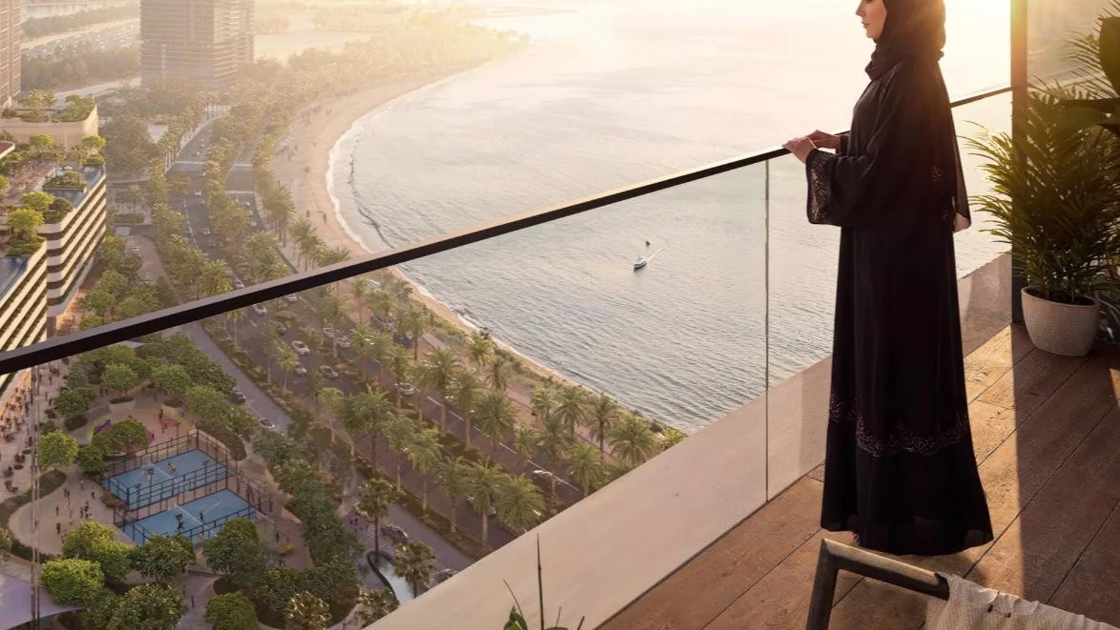 Balcony view across Al Mamzar beach and the landscaped podium at Linar by Alef.