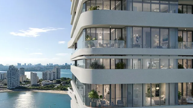 Curved waterfront facade and sea-facing balconies at Linar by Alef.