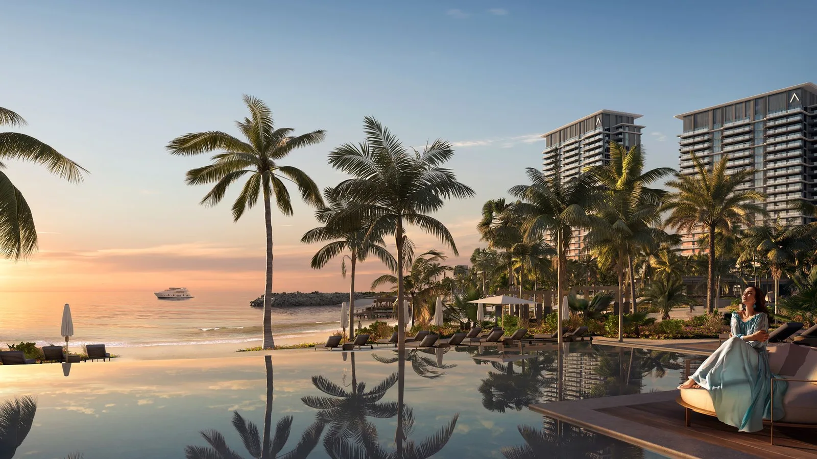 Address Residences Al Marjan Island infinity pool beside the private beach at sunset