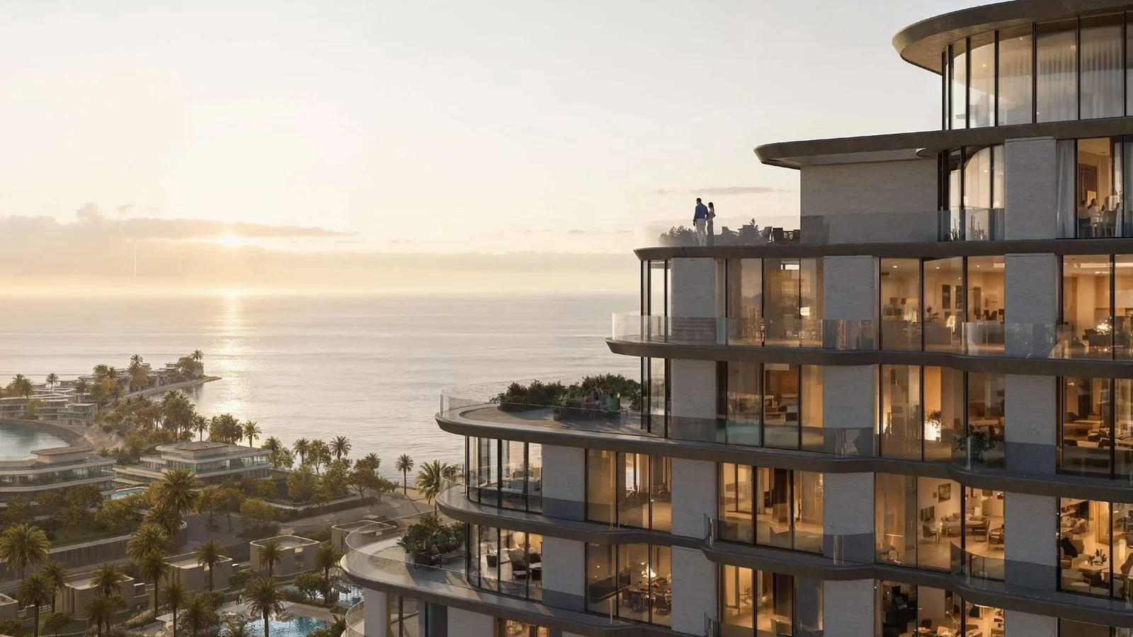 Mirasol cascading terraces framing a sunset over the Arabian Gulf