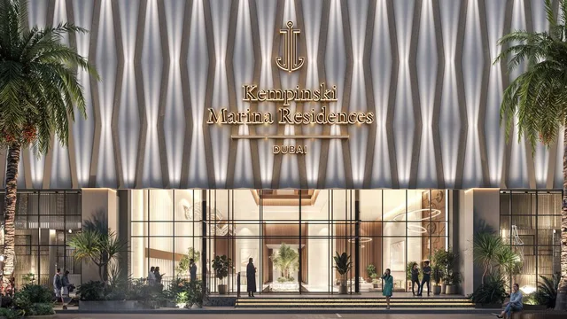 Kempinski Marina Residences entrance with landscaped palms