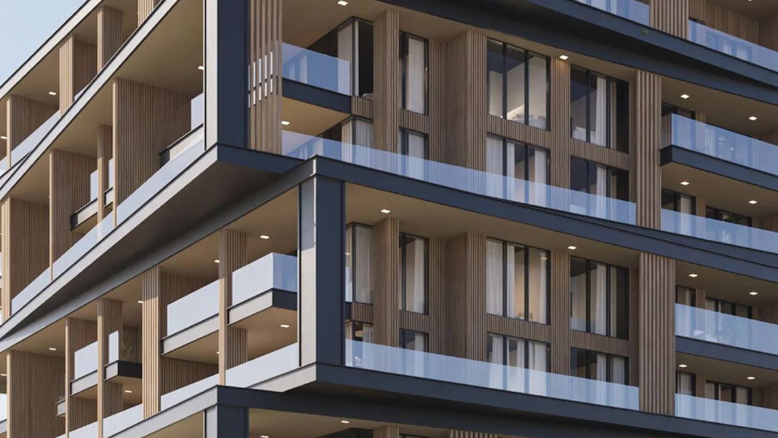 Layered balconies and contemporary facade of Uno Luxe