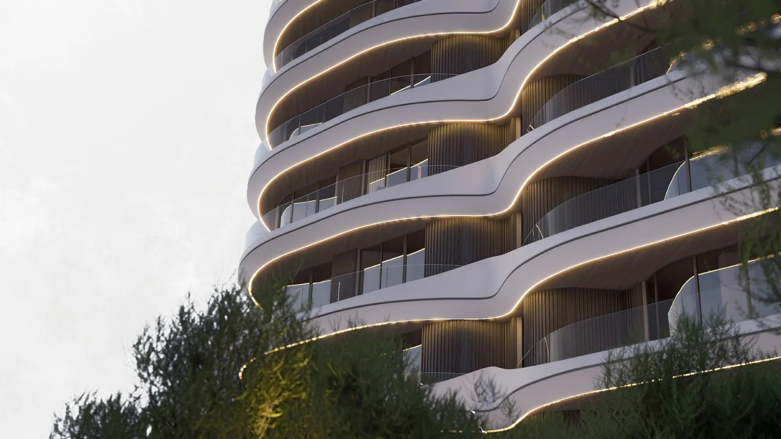 Flow 25 tower viewed through landscaped planting on Al Reem Island