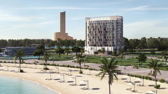 Island Heights viewed across the Al Marjan Island beach and landscaped waterfront