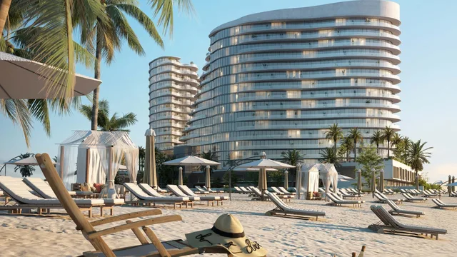 The Beach Residences curved beachfront buildings viewed from the Al Marjan Island beach