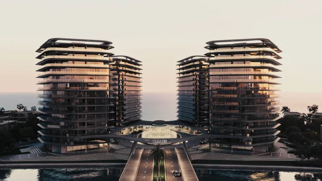 Four waterfront residential towers at Brabus Island viewed from the main approach