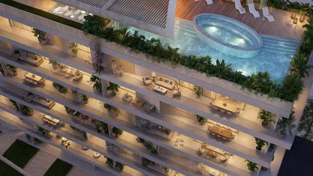 Aerial view of Lunaya Terraces with rooftop pool and planted balconies