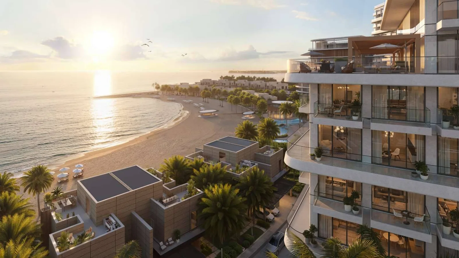 Aerial view of Nasim Al Bahr Residences beside its private bay on Al Marjan Island.