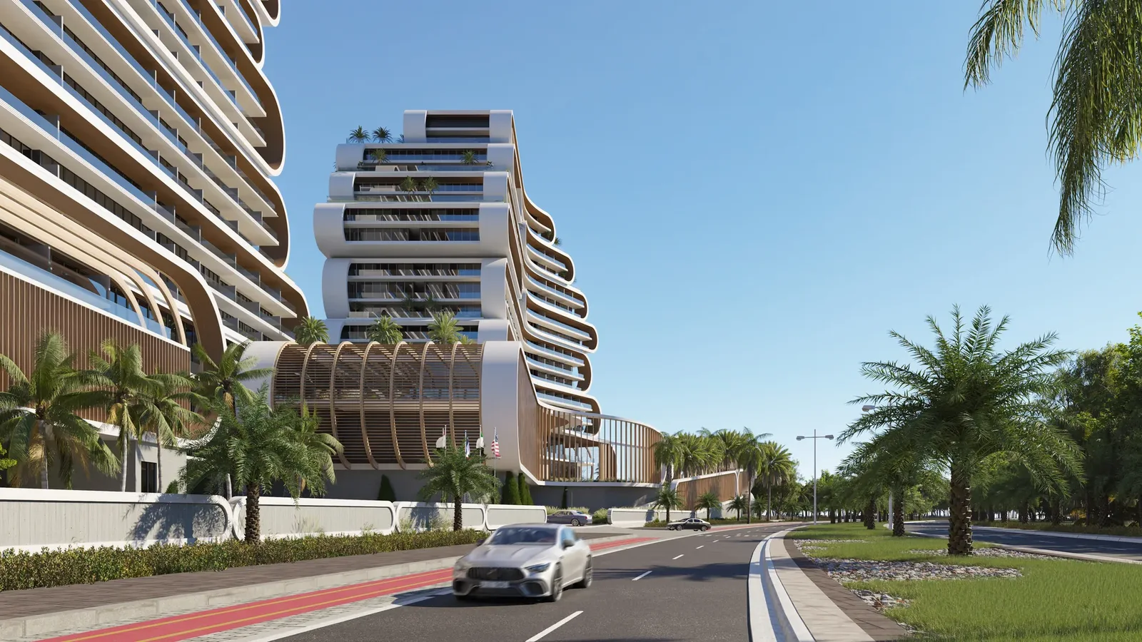 Landscaped arrival drive and curved facade at JW Marriott Residences