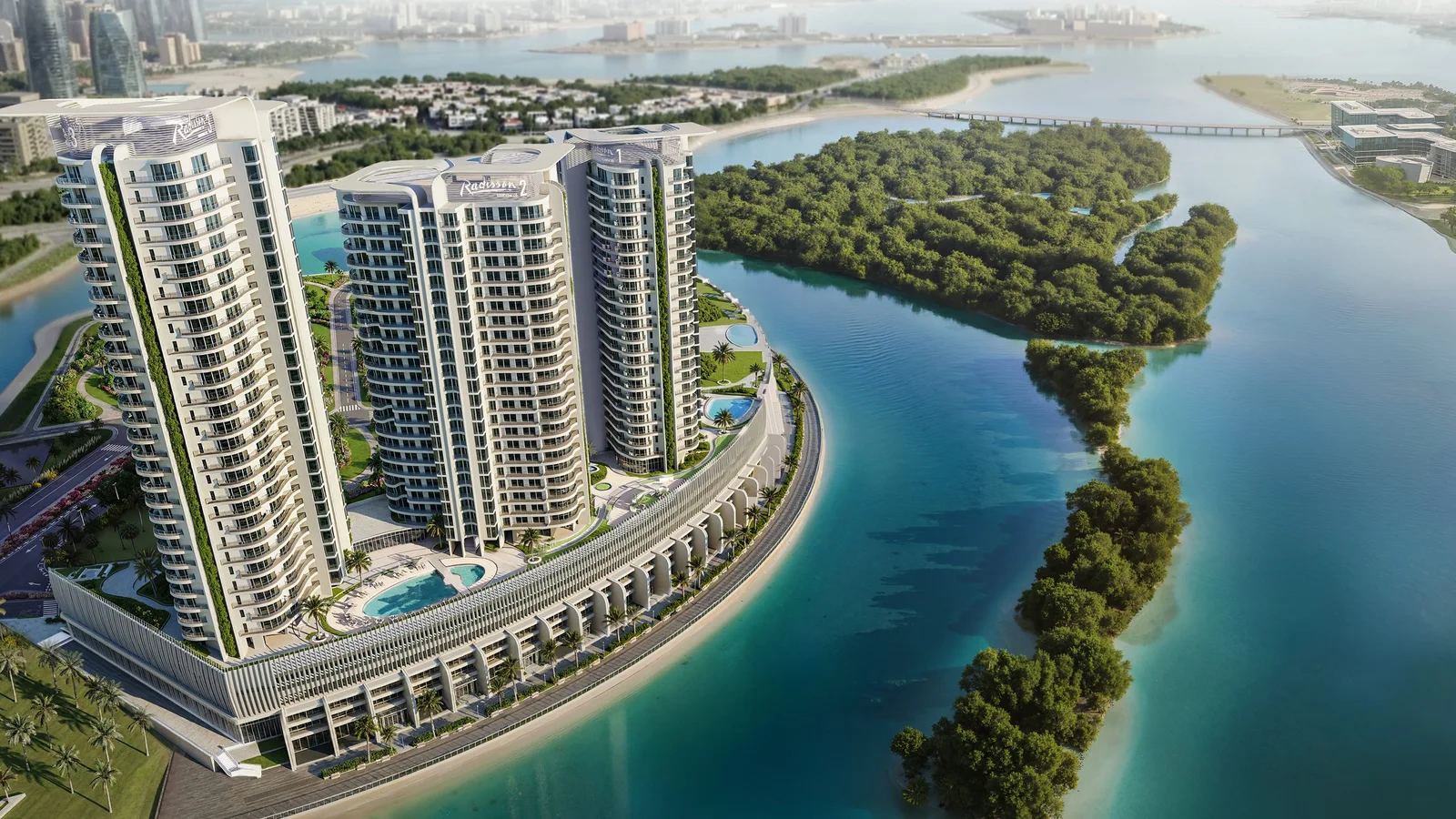 Aerial view of the three Radisson Residences towers and waterfront podium on Al Reem Island