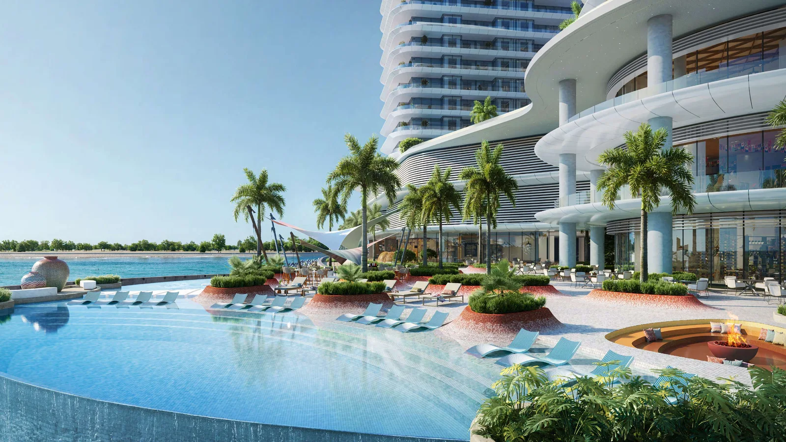 Landscaped pool deck and waterfront seating at Trio Isle Queen B