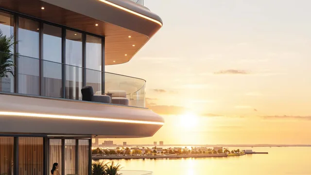 Sea-facing curved balconies at Bab Al Qasr Sea View Residence 51 at sunset