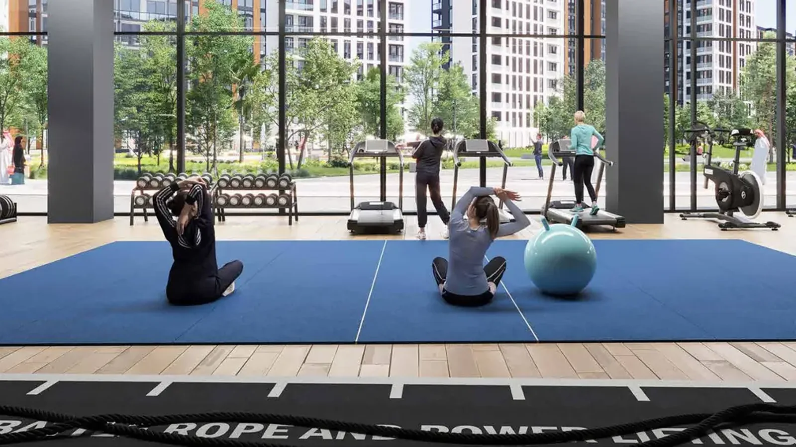 Olfah fully equipped indoor gym with panoramic community views