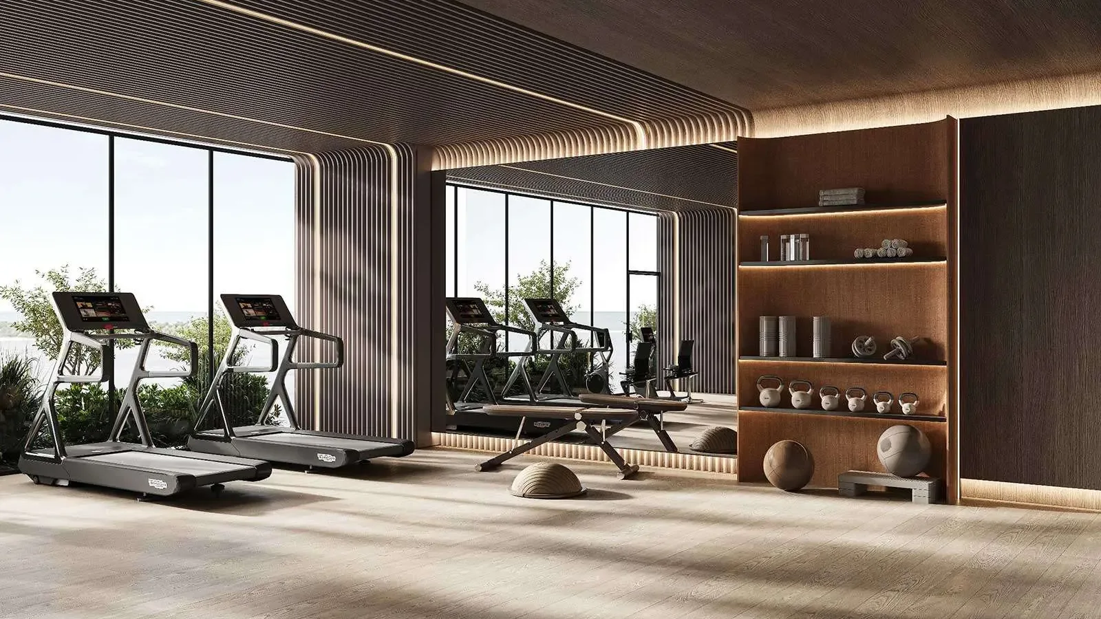 Divine Al Barari fitness studio with treadmills and strength equipment