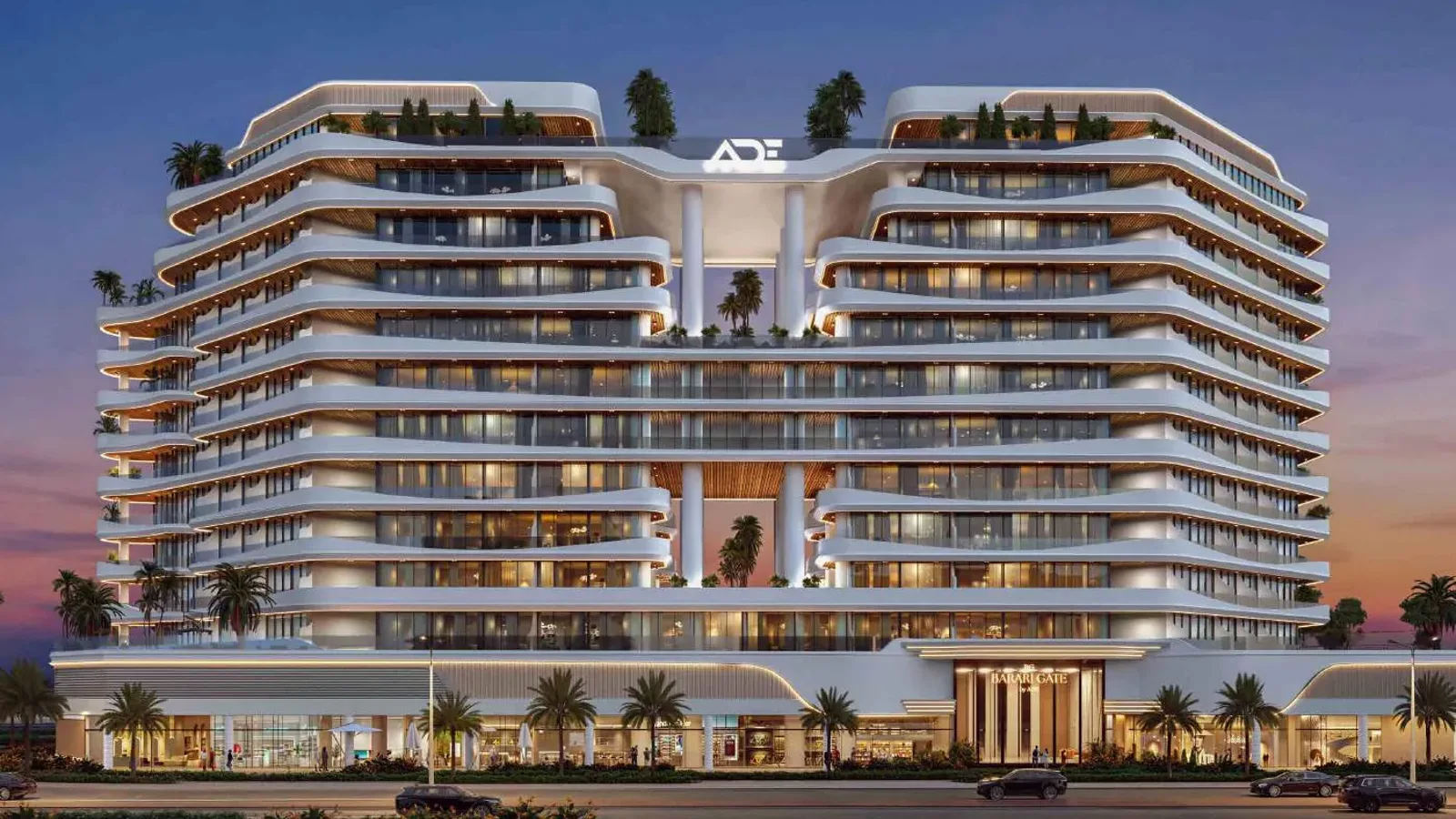 Barari Gate front elevation with illuminated curved balconies at dusk