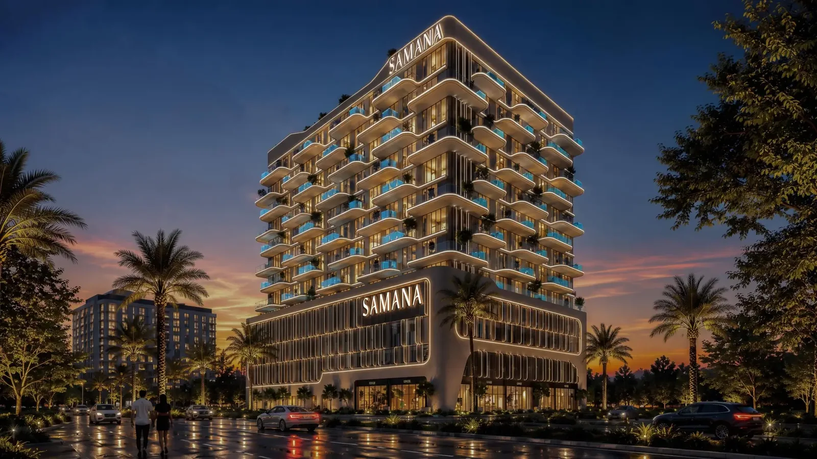 Samana Portside corner exterior with illuminated balconies at night
