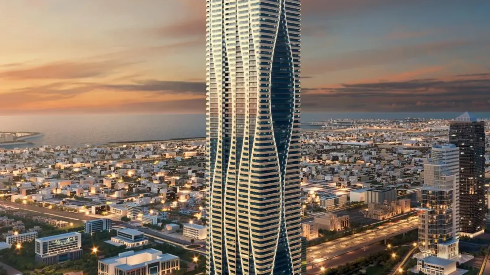 Bayz 102 illuminated tower at dusk in Business Bay
