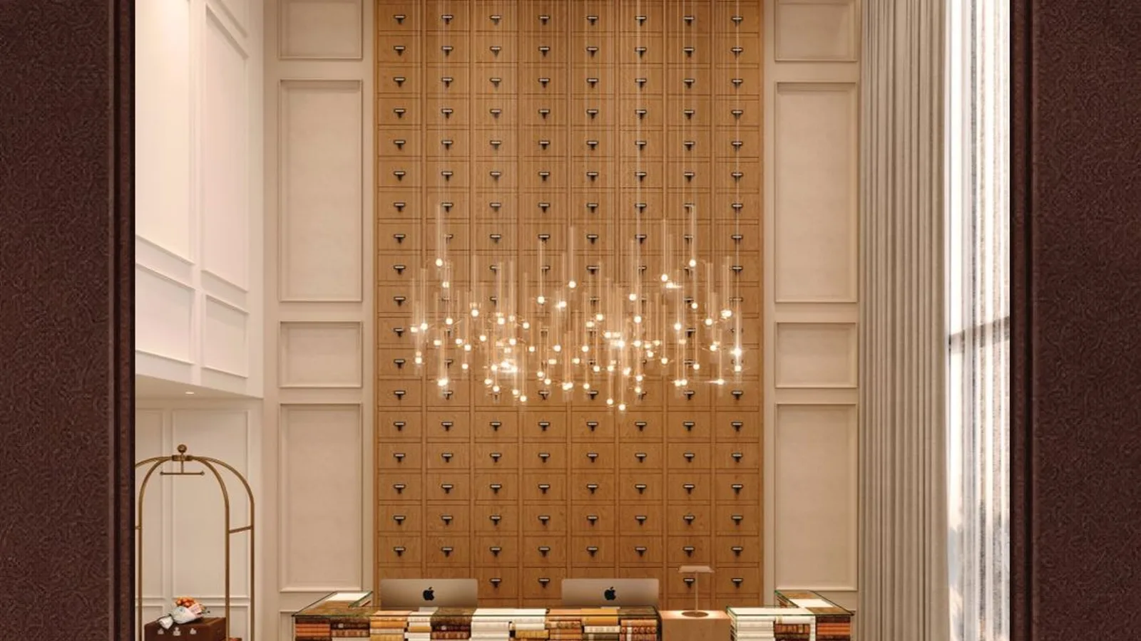 Book-lined reception desk inside The Archive arrival lobby