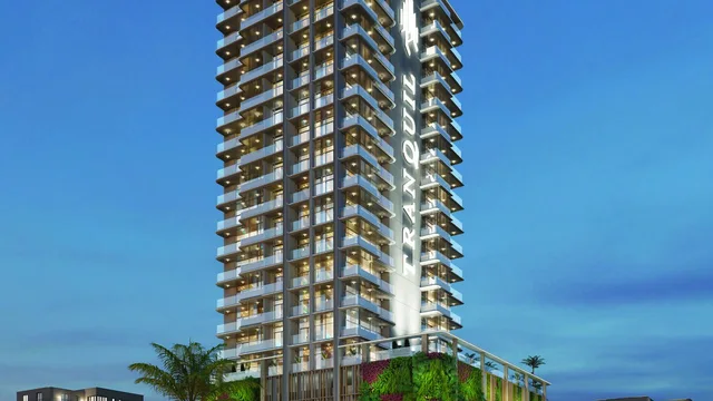 Blossom 76 illuminated tower exterior with planted podium facade