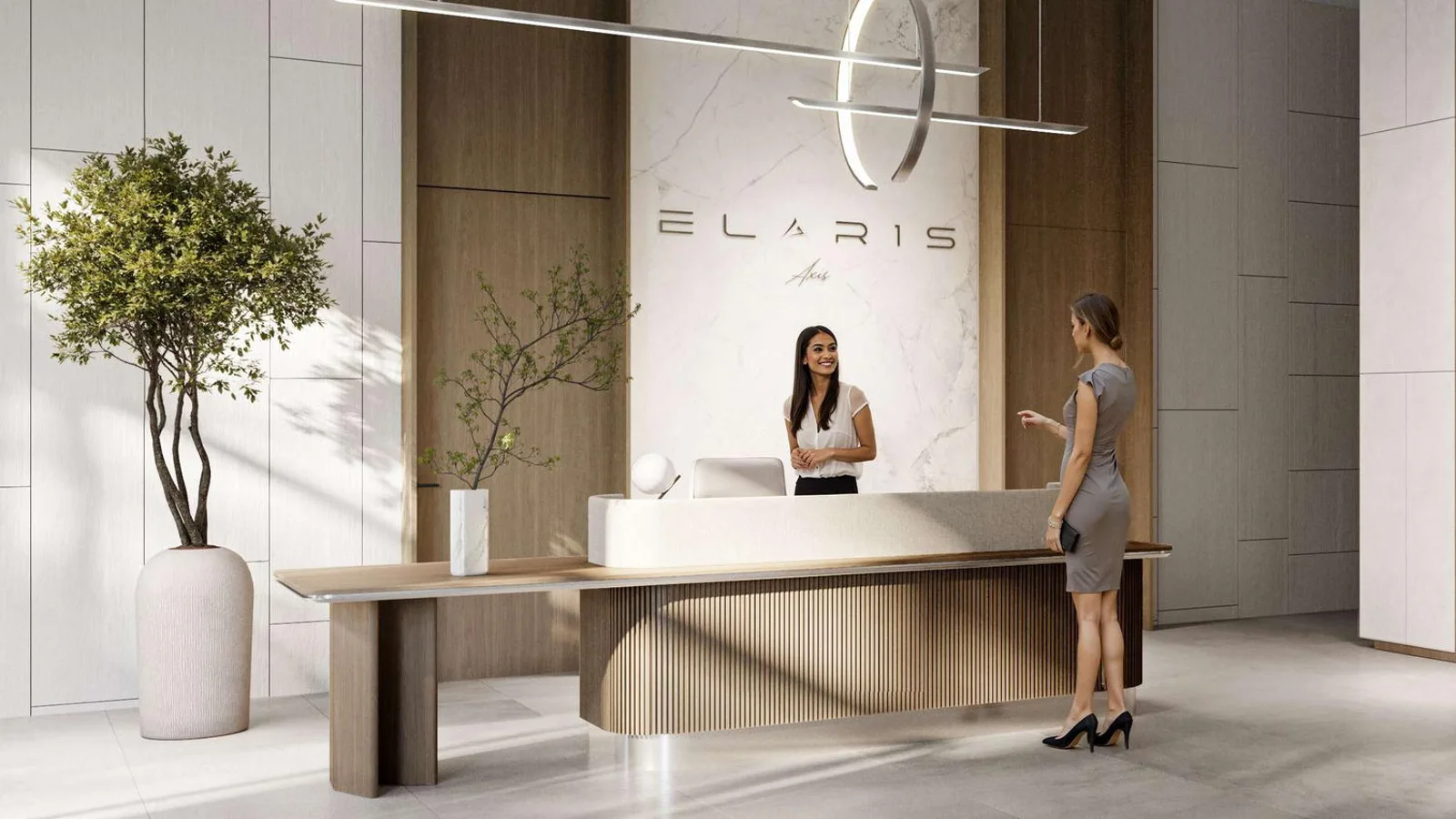 ELAR1S Axis reception lobby with a curved desk, stone wall and indoor planting.